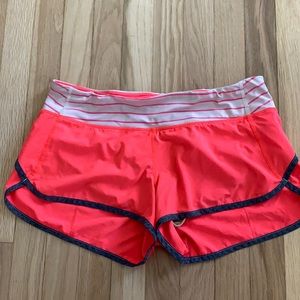 Pink lululemon running shorts